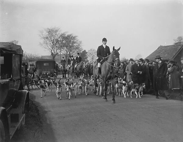 Opening meet of the Quorn Hunt at Kirby Gate. The huntsman with the pack. 10