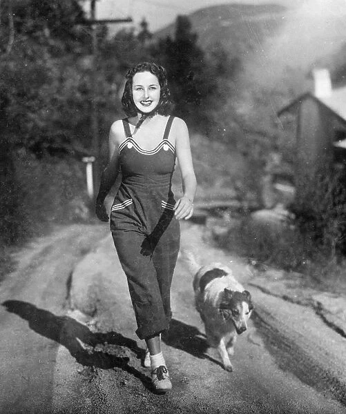 Overalls as film actress walking costume. Barbara Read, the film actress, prefers