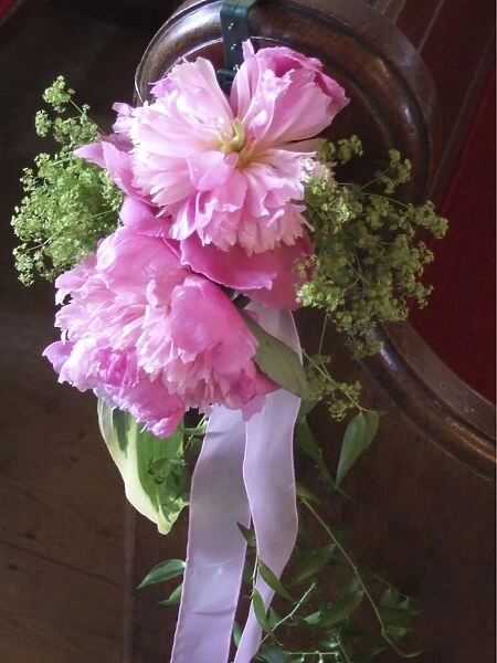 Paeonies and alchemilla mollis as pew end decoration, for summer country wedding credit
