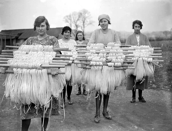 Panama Hat making at Messrs I. Cambis at Boreham Wood, Elstree. Carrying skins