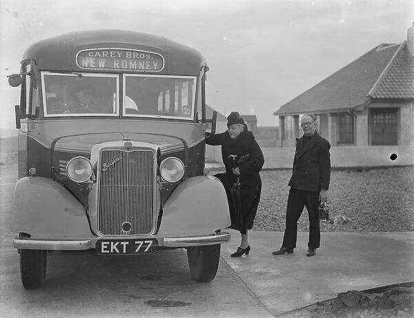 Passengers getting onto a Carey Bros Bedford coach in New Romney, Kent