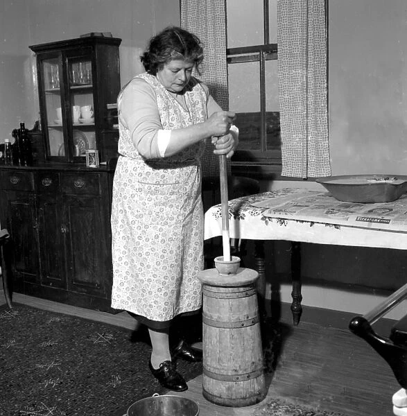 Peggy McLeod makes butter by hand croft in South Ulst Outer Hebrides September 1961