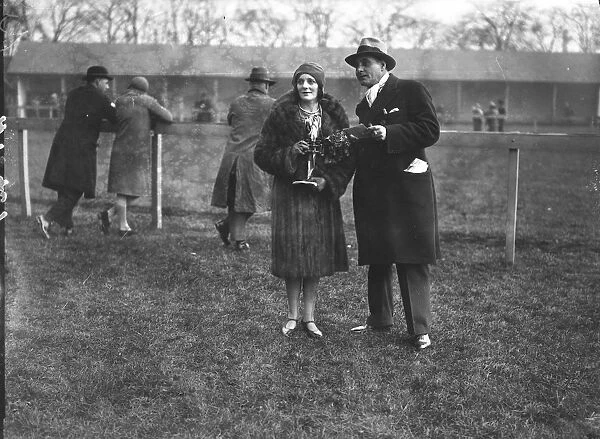 Pictured at the Derby races are the actors, Mr and Mrs Henry Edwards ( Mrs Edwards