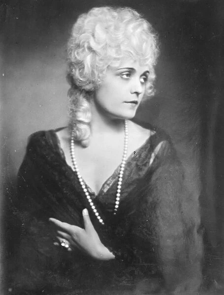 Pola Negri as a French Marquise. Pola Negri, who has just built a beautiful new