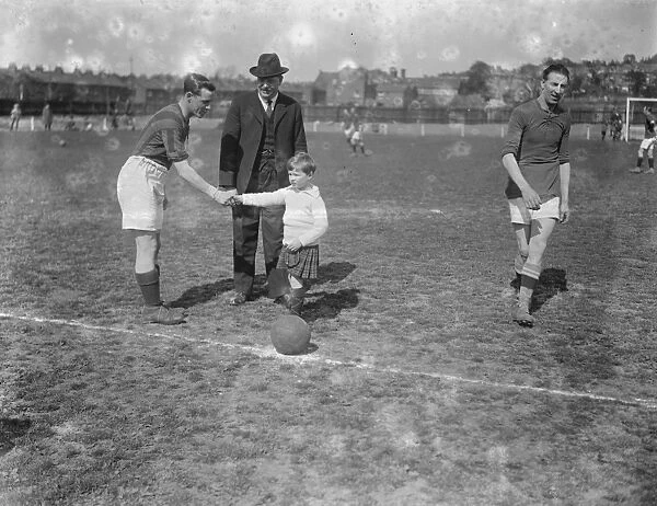 Police football match at Cricklewood, London. Viscount Raynham with one of the players