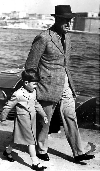 Prince Charles, escorted by Lord Mountbatten as they went ashore at Malta from Royal