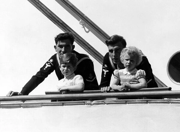 Prince Charles and Princess Anne on board the Royal yacht Britannia sailing into