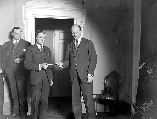 The Prince of Wales receives from Captain J. Potter Miss Marion Davies cheque for