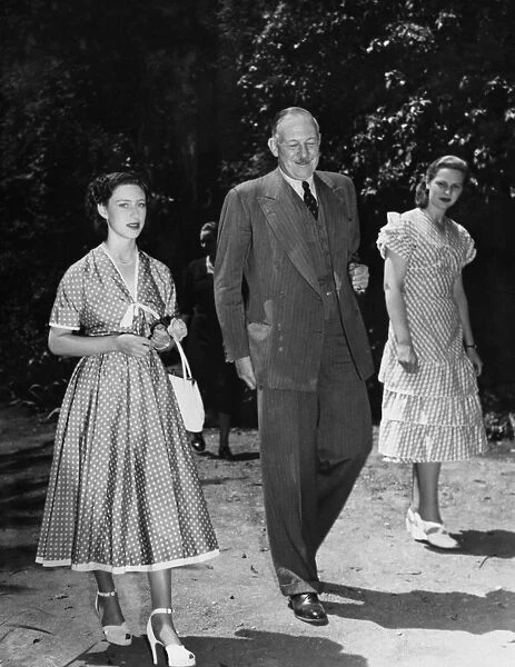 Princess Margaret walks in the garden of the British Embassy in Rome, with the British Ambassador