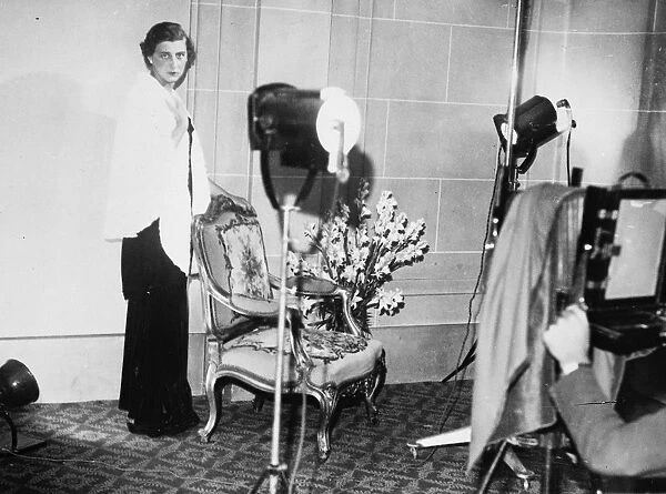 Princess Marina is photographed trying on a trousseau gown 14 September 1934