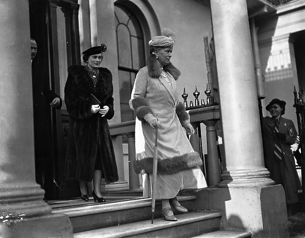 Queen Mary and the Duchess of Gloucester leaving Belgrave Square for the Christening