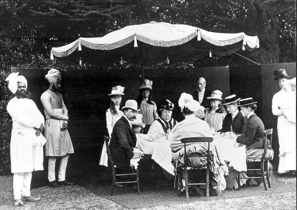 Queen Victoria at breakfast in Osborne Gardens with the Duke of Connaught, Princess Beatrice