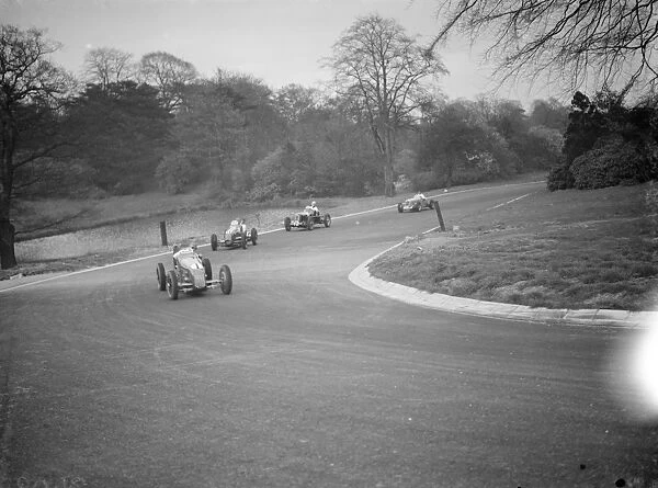 Race cars take the Pond hair pin. 1938 Crystal Palace