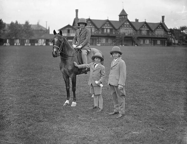 Ranelagh horse and pony show. Miss Rosalind Cubitt ( mounted ), Master Harry Cubitt