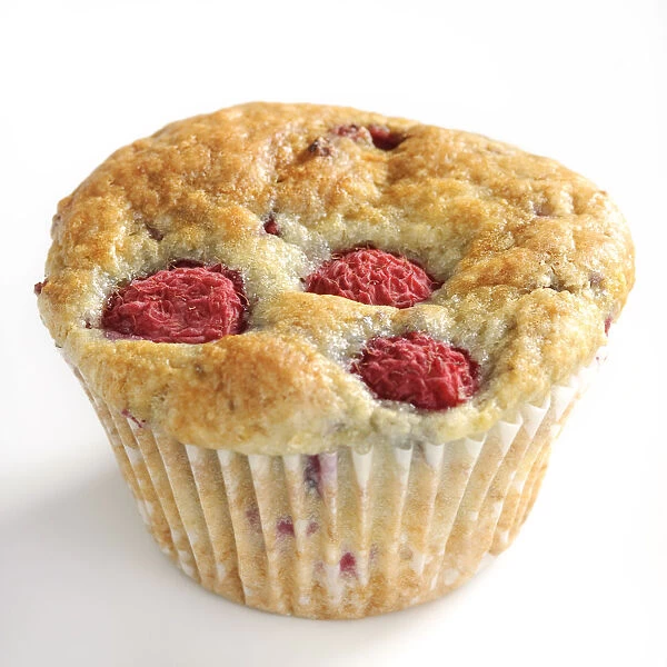 Raspberry muffins on white background credit: Marie-Louise Avery  /  thePictureKitchen