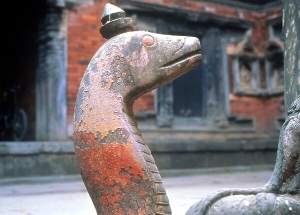 Rearing snake (naga) around the Buddhist well, or royal bath (dated circa 1670) in the Tusa Hiti