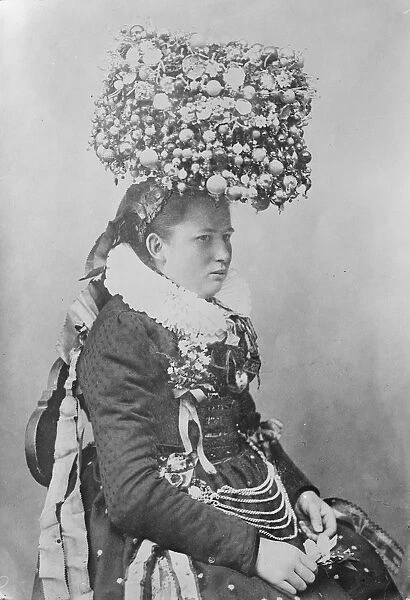Remarkable head dress worn by a bride in the Black Forest country of Germany 25 May 1920