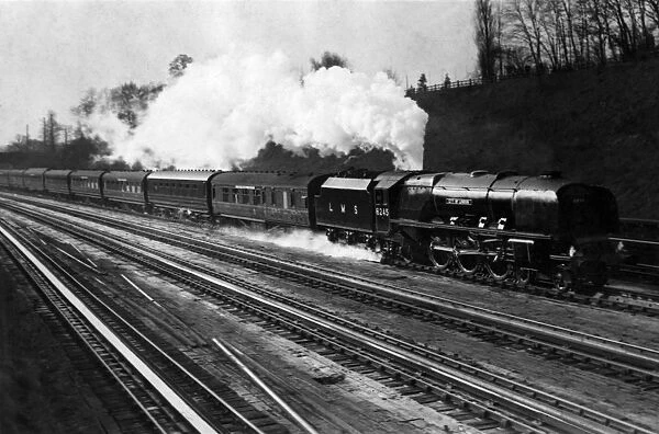 The Royal Scot drawn by Locomotive City of London at speed at Bushey Hertfordshire