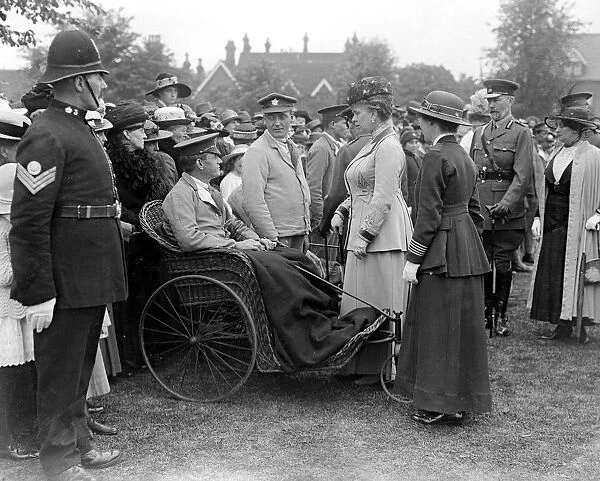 Royal visit to Bedford. Their Majesties talking to wounded soldiers at Bedford School