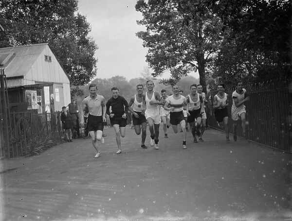 Runners from the Dartford Harriers during a road race. 25 October 1935
