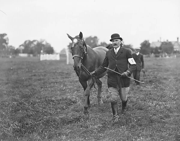 At the Rutland County Show at Oakham. Captain Hobbs and his horse. 1931