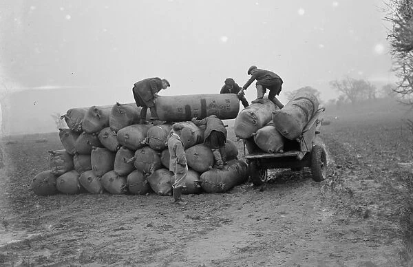 Sacks of surplus hops, which will be used as manure, stacked on to a horse and cart