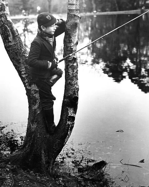 Schoolboy fishing at Keston Ponds, Kent