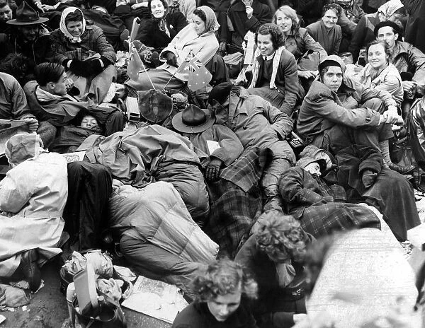 A section of the crowd which wait all night seen still asleep in Trafalgar Square