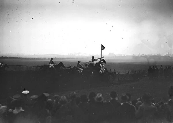 Sensational Grand National. Some of the field taking the famous Bechers Brook