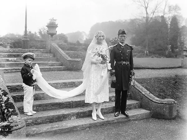 At Sherbourne Abbey, Dorset, the wedding took place of Miss P Grace and Paymaster