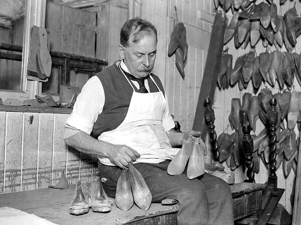 Last and shoe making at W. H. Smith, Sloane Street. Models of the feet of the Duchess of York
