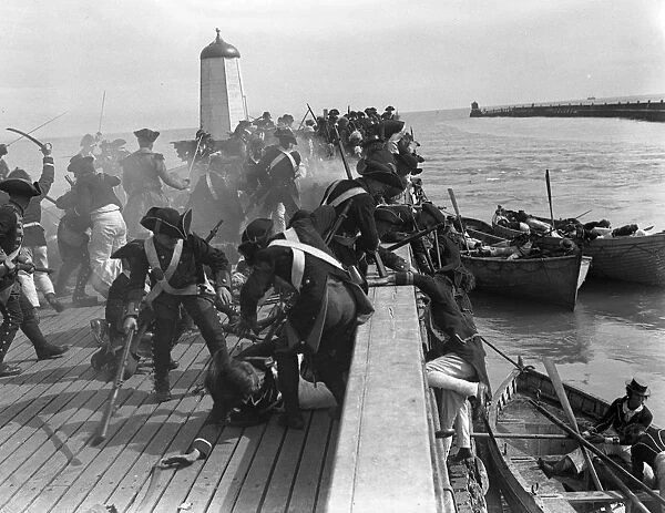 Shooting an action scene from the film Nelson at the seafront at Littlehampton, Sussex