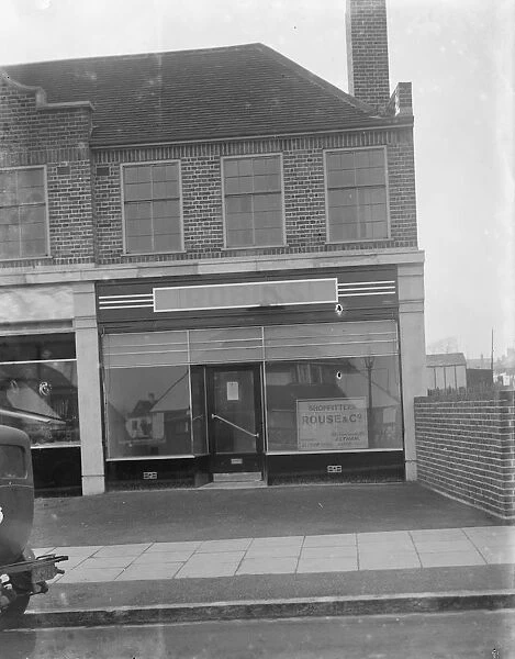 The empty shop window of Robins Stores at Grove Park. 1936