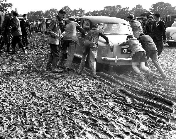 There was no shortage of help at the end of the day when several cars were bogged in mud