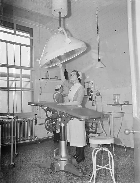 The Sidcup Cottage Hospital in Kent. A sister woking in the operating theatre
