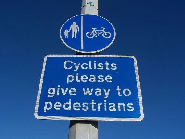 Sign with blue circle indicating segregated pedal cycle and pedestrian route with