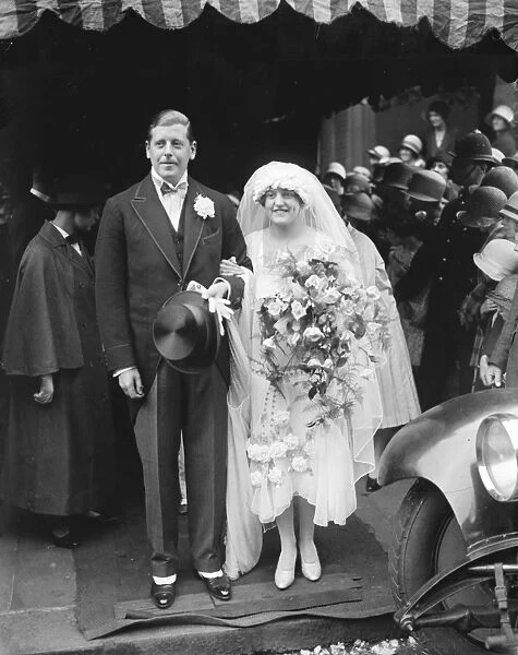 Sir Alfred Monds daughter weds. Sir Alfred and Lady Monds daughter Miss Nora Mond