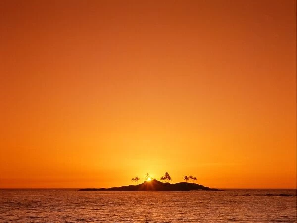 Small un-named island near Bandos, in the Maldiveds, at sunrise