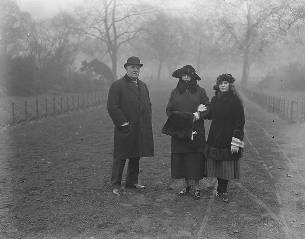 Society in the Park. Sir Charles and Lady Walpole photographed in Hyde Park with their daughter