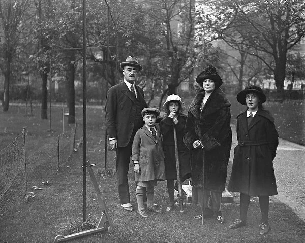 Society in the Park. Viscount and Viscountess Falkland in the Park with three of their children