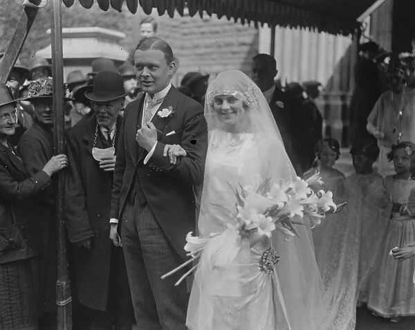 A society wedding. Mr Adrian Es Stokes and Miss Arabella Chisholm were married