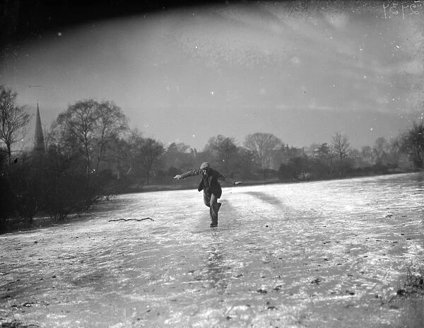 A solitary skater on the ice at Chislehurst, Kent. 1936