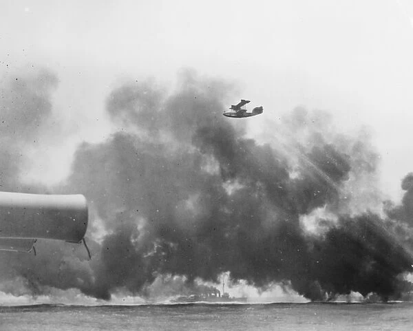 Spectacular scene showing destroyers laying a smoke screen. Destroyers of the American