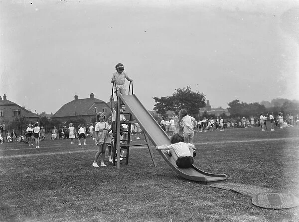 Sports day at the Days Lane Infant School in Sidcup, Kent. Children on the slide
