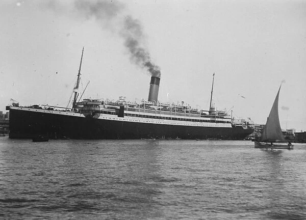 SS Megantic coaling in Port Said harbour with troops on board for the Far East. 4