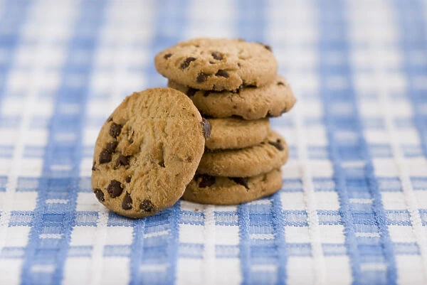 Stack of chocolate chip cookies from supermarket credit: Marie-Louise Avery  /  thePictureKitchen
