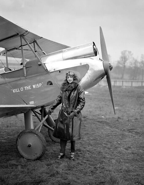 At Stag Lane Aerodrome. Mrs Spencer Cleaver before leaving in their Gypsy Moth