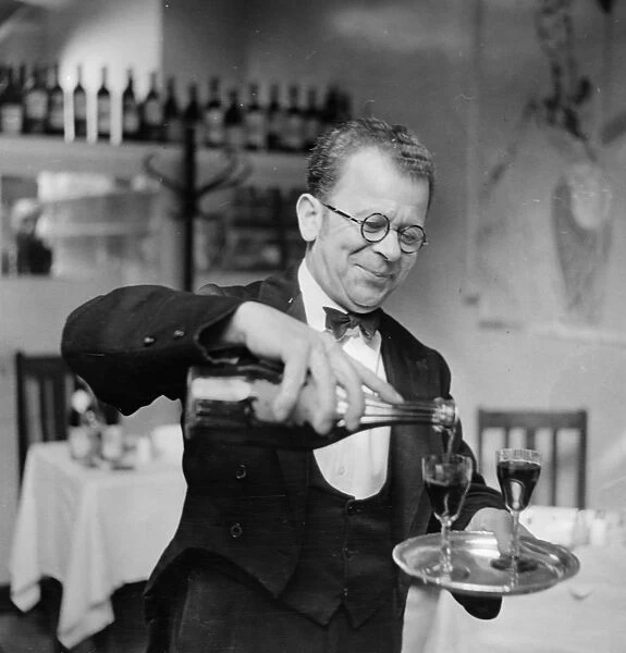 Stefan, the wine waiter at the de l Elysee in Percy Street, Soho, London, England 18