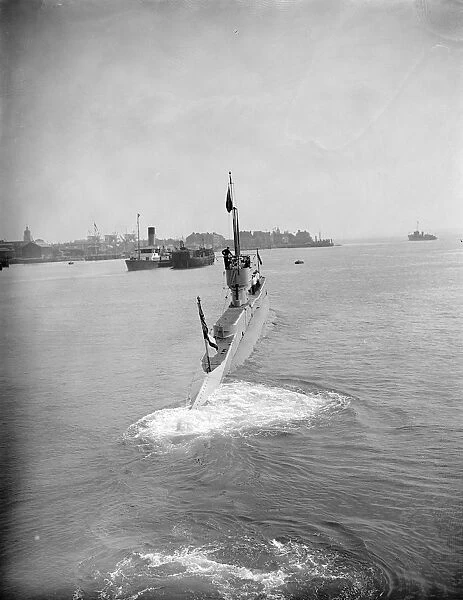 The Sultan of Muscat at Portsmouth. Submarine flying the red flag. 22 September 1928