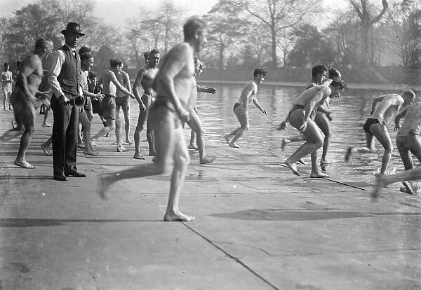 Sunbathers rushing to dive into the water. 1933